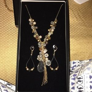 Gold long necklace with pearls. & long earrings.